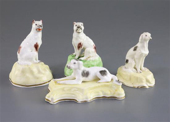Four Samuel Alcock porcelain figures of dogs, c.1840-50, H. 5.8cm -10cm